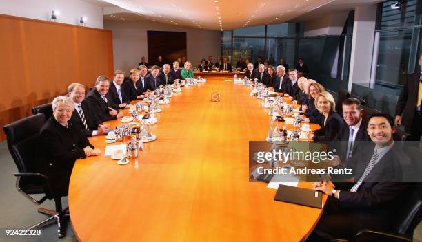 The new German cabinet including Education Minister Annette Schavan , Development Minister Dirk Niebel , Minister of Work and Social Issues Franz...