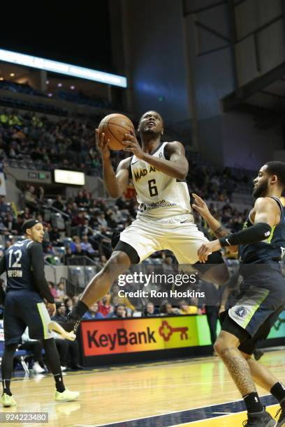 Tra-Deon Hollins of the Fort Wayne Mad Ants lays it up over Melo Trimble of the Iowa Wolves on February 25, 2018 at Memorial Coliseum in Fort Wayne,...