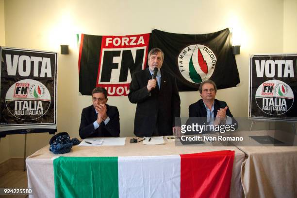 Attilio Carelli of Fiamma Tricolore party speaks at a rally as Roberto Fiore , leader of far-right party Forza Nuova looks on at the Esedra Palace...