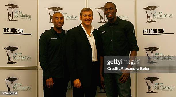 The Long Run' charity embassadors and sprinter Usain Bolt of Jamaica and former sprinter Colin Jackson from Great Britain and Jochen Zeitz, founder...