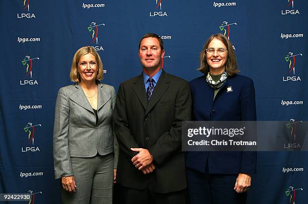 Michael Whan is announced as the new commissioner of the LPGA and poses for a photo with LPGA directors Dawn Hudson and Leslie Greis following a...