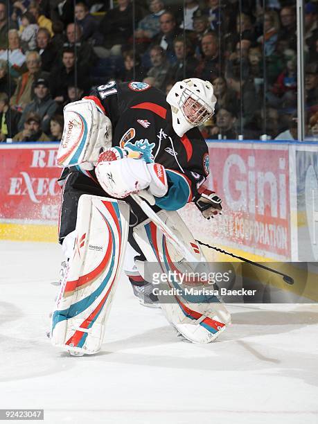Adam Brown of the Kelowna Rockets makes a pass against the Vancouver Giants at Prospera Place on October 24, 2009 in Kelowna, British Columbia,...