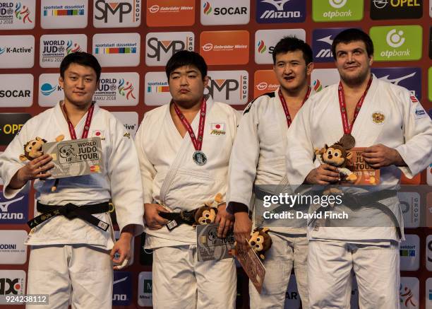 The unprecedented situation for the over 100kg medallists L-R: Silver; Hisayoshi Harasawa and Takeshi Ojitani after both were disqualified in the...