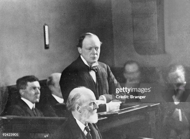 Winston Churchill , British politician, giving evidence during the English anarchists' trial in 1912.