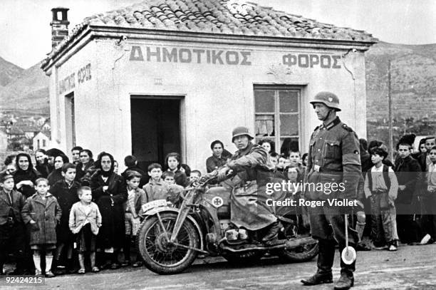 World War II. Invasion of Greece by the German army. Greek civilians looking at the Germany army making its way to Salonica, on April 9, 1941.