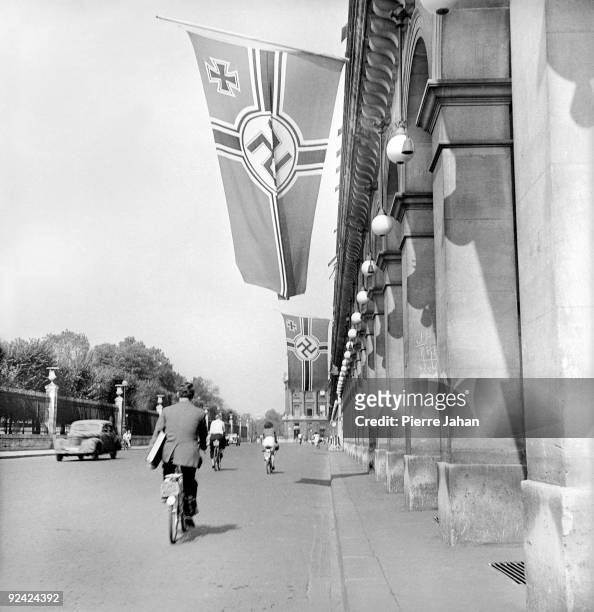 World War II. Paris during the Occupation. German flags, rue de Rivoli, on the facade of the Meurice hotel, headquarters of the German Kommandantur.