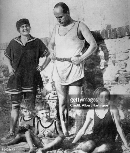 Benito Mussolini with his family on holiday on an Adriatic beach.