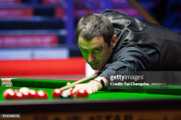 Ronnie O'Sullivan of England plays a shot during the final match against Ding Junhui of China on day seven of 2018 Ladbrokes World Grand Prix at...