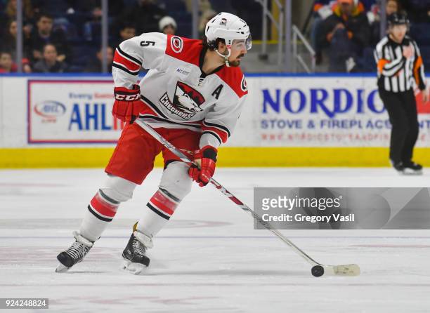 Trevor Cassick of the Charlotte Checkers controls the puck during a game against the Bridgeport Sound Tigers at the Webster Bank Arena on February...