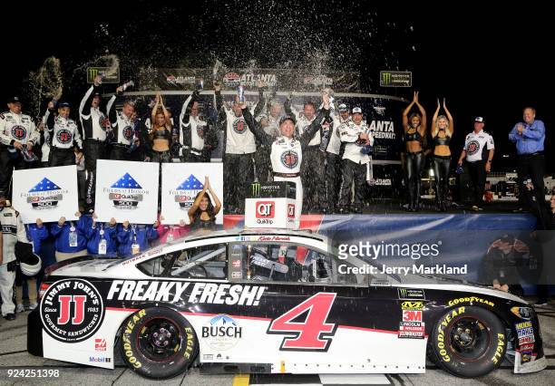 Kevin Harvick, driver of the Jimmy John's Ford, celebrates in Victory Lane after winning the Monster Energy NASCAR Cup Series Folds of Honor QuikTrip...