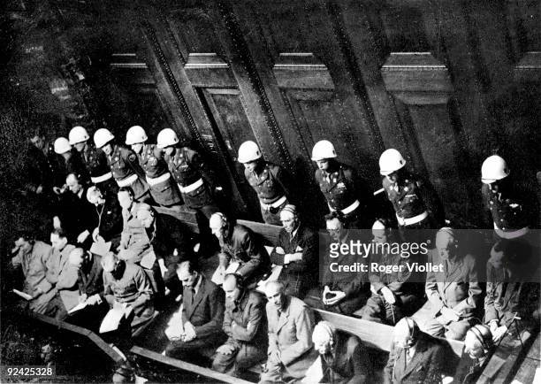 Nuremberg trials . First row, from left to right: Goering, Hess, Ribbentrop, Keitel, Rosenberg, Frank, Frick, Streicher, Funk and Schacht. Second...