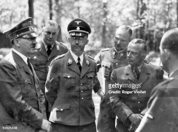 Adolf Hitler with Himmler. From Eva Braun's album.