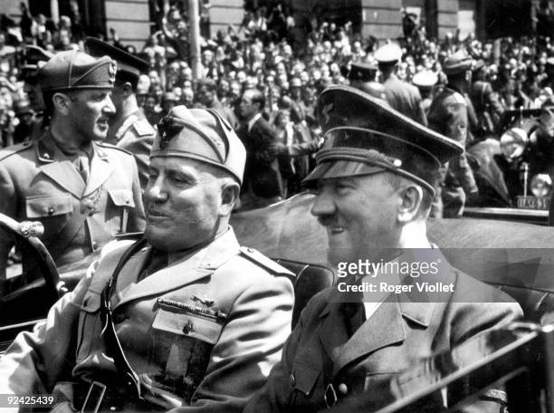 Adolf Hitler , German statesman, and Benito Mussolini , Italian statesman. From Eva Braun's album.
