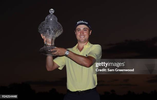 Justin Thomas poses with the trophy after winning The Honda Classic at PGA National Resort and Spa on February 25, 2018 in Palm Beach Gardens,...