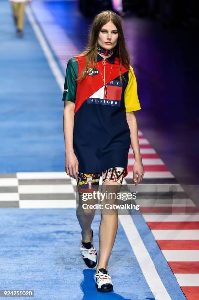 Model walks the runway at the TOMMYNOW by Tommy Hilfiger Spring Summer 2018 fashion show during Milan Fashion Week on February 25, 2018 in Milan,...