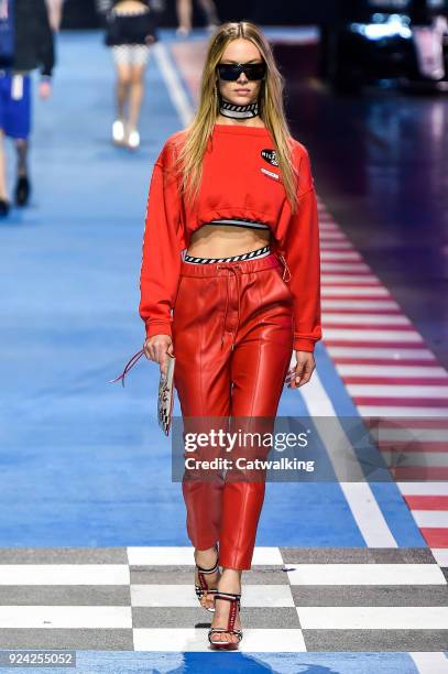 Model walks the runway at the TOMMYNOW by Tommy Hilfiger Spring Summer 2018 fashion show during Milan Fashion Week on February 25, 2018 in Milan,...