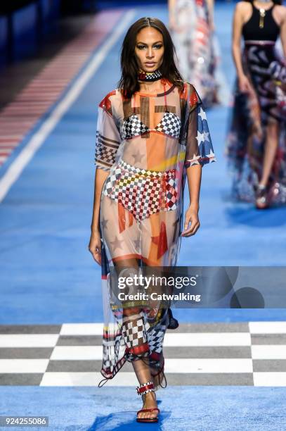 Model walks the runway at the TOMMYNOW by Tommy Hilfiger Spring Summer 2018 fashion show during Milan Fashion Week on February 25, 2018 in Milan,...