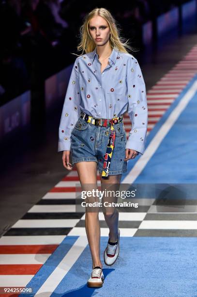 Model walks the runway at the TOMMYNOW by Tommy Hilfiger Spring Summer 2018 fashion show during Milan Fashion Week on February 25, 2018 in Milan,...