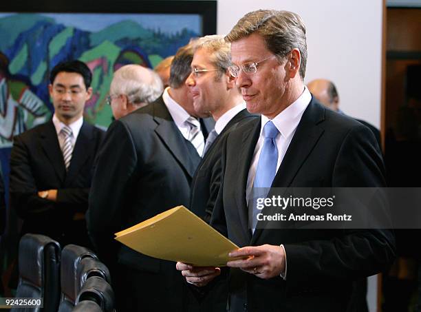 The new German cabinet member, Vice Chancellor and Foreign Minister Guido Westerwelle attends the start of their first meeting on October 28, 2009 in...