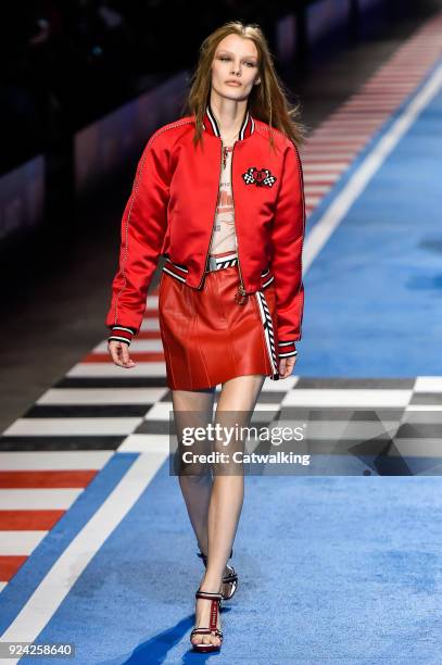 Model walks the runway at the TOMMYNOW by Tommy Hilfiger Spring Summer 2018 fashion show during Milan Fashion Week on February 25, 2018 in Milan,...