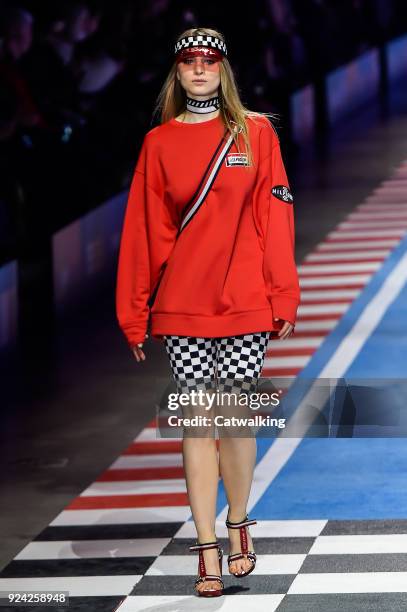 Model walks the runway at the TOMMYNOW by Tommy Hilfiger Spring Summer 2018 fashion show during Milan Fashion Week on February 25, 2018 in Milan,...