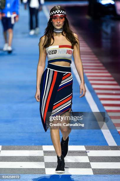 Model walks the runway at the TOMMYNOW by Tommy Hilfiger Spring Summer 2018 fashion show during Milan Fashion Week on February 25, 2018 in Milan,...