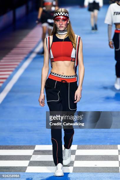 Model walks the runway at the TOMMYNOW by Tommy Hilfiger Spring Summer 2018 fashion show during Milan Fashion Week on February 25, 2018 in Milan,...