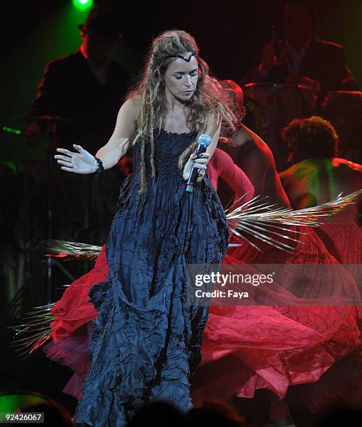 Brazilian pop singer Daniela Mercury performs during Lino Villaventura's fashion show on Oi Fashion Rocks at Rio's Jockey Club on October 24, 2009 in...