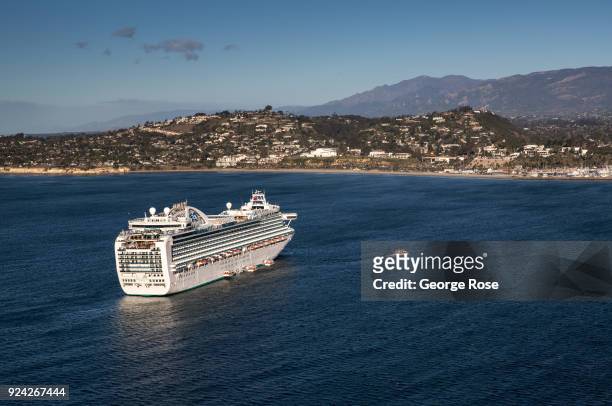 The Ruby Princess, a Grand-class cruise ship operated by Princess Cruises, is viewed in this aerial photo docked in the harbor on February 23 in...