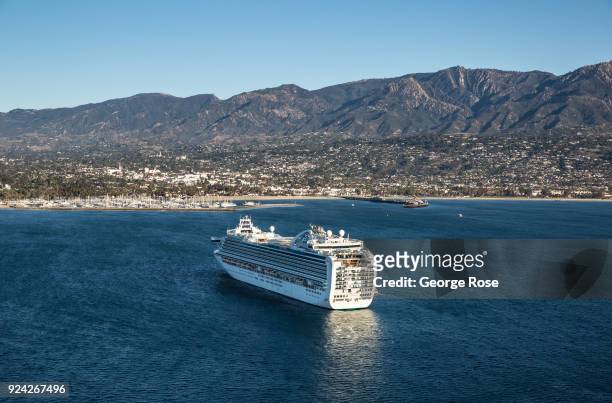 The Ruby Princess, a Grand-class cruise ship operated by Princess Cruises, is viewed in this aerial photo docked in the harbor on February 23 in...