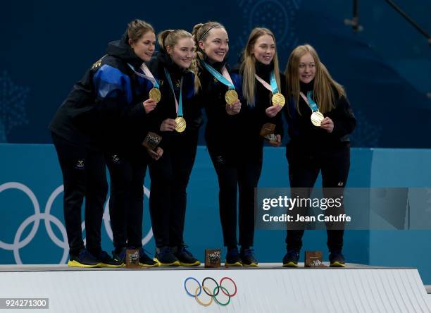 Gold medalists Anna Hasselborg, Sara McManus, Agnes Knochenhauer, Sofia Mabergs, Jennie Waahlin of Sweden celebrate during the victory ceremony...