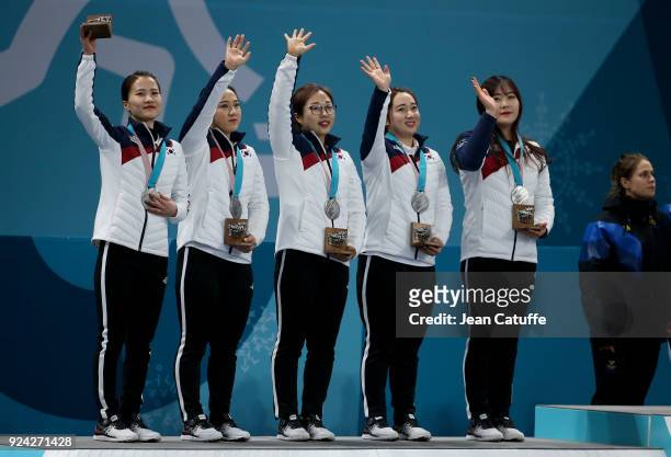 Silver medalists Kim Eunjung, Kim KyeongAe, Kim SeonYeong, Kim YeongMi, Kim Chochi of Republic of Korea during the victory ceremony following the...