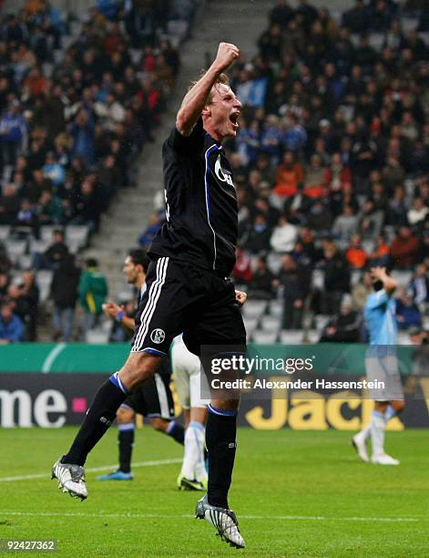 Benedikt Hoewedes of Schalke celebrates after scoring his team third goal during the DFB Cup round of 16 match between 1860 Muenchen and FC Schalke...