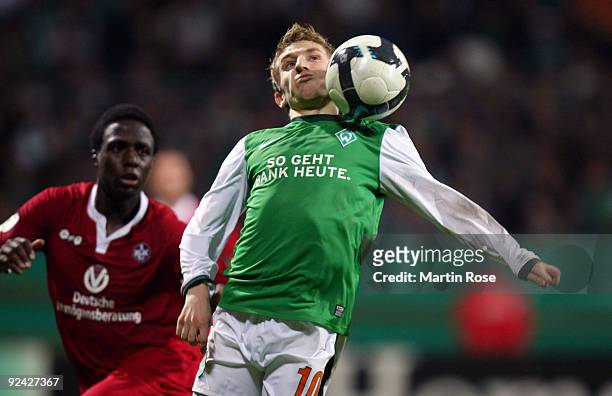 Marko Marin of Bremen stops the ball during the DFB Cup round of 16 match between between Werder Bremen and 1. FC Kaiserslautern at the Weser stadium...