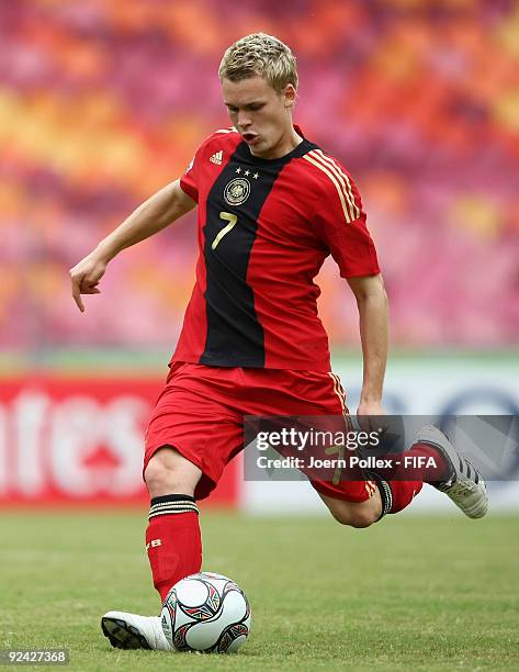 Christopher Buchtmann of Germany plays the ball during the FIFA U17 World Cup Group A match between Argentina and Germany at the Abuja National...