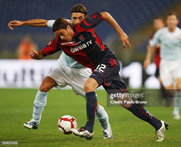 Sebastiano Siviglia of SS Lazio and Alessandro Matri of Cagliari Calcio in action during the Serie A match between SS Lazio and Cagliari Calcio at...