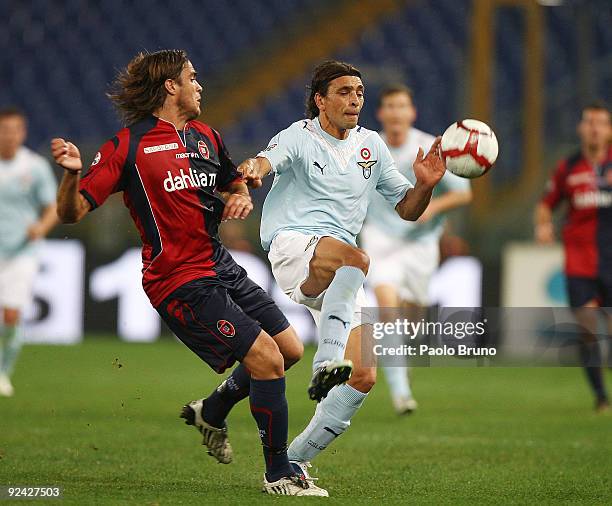 Sebastiano Siviglia of SS Lazio and Alessandro Matri of Cagliari Calcio compete for the ball during the Serie A match between SS Lazio and Cagliari...