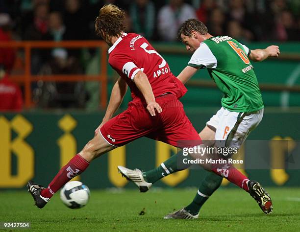 Tim Borowski of Bremen shoots at goal during the DFB Cup round of 16 match between between Werder Bremen and 1. FC Kaiserslautern at the Weser...