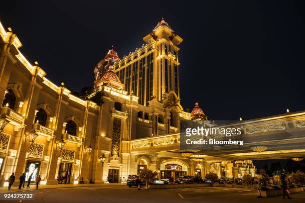 The Galaxy Macau casino and hotel, developed by Galaxy Entertainment Group Ltd., stands illuminated at night in Macau, China, on Saturday, Feb. 24,...