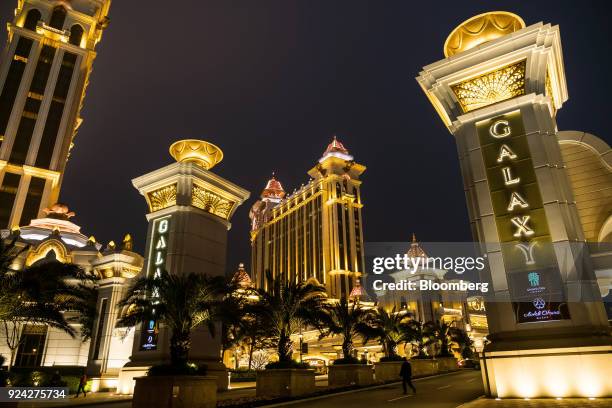 The Galaxy Macau casino and hotel, developed by Galaxy Entertainment Group Ltd., stands illuminated at night in Macau, China, on Saturday, Feb. 24,...