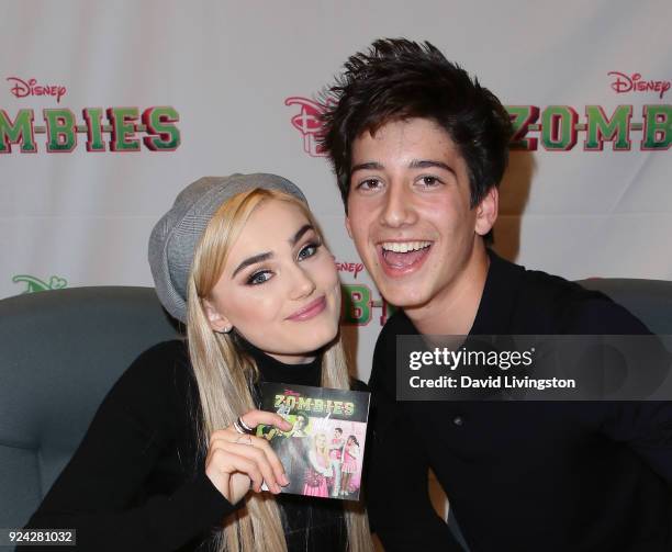 Actors Meg Donnelly and Milo Manheim attend a soundtrack signing for Disney Channel's "Zombies" at Barnes & Noble at The Grove on February 25, 2018...