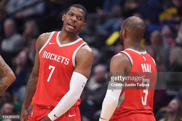 Houston Rockets guard Joe Johnson talks with Houston Rockets guard Chris Paul during a timeout during the game against the Denver Nuggets at Pepsi...