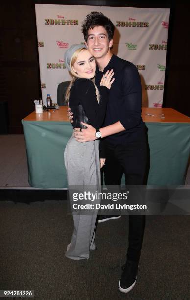 Actors Meg Donnelly and Milo Manheim attend a soundtrack signing for Disney Channel's "Zombies" at Barnes & Noble at The Grove on February 25, 2018...