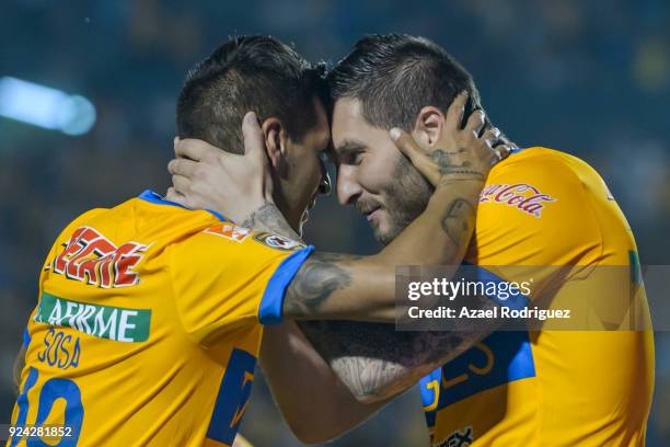 Andre-Pierre Gignac of Tigres celebrates with teammate Ismael Sosa after scoring his team's first goal during the 9th round match between Tigres UANL...