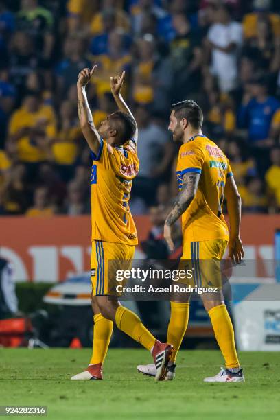 Rafael De Souza of Tigres celebrates with teammate Andre-Pierre Gignac after scoring his team's second goal during the 9th round match between Tigres...