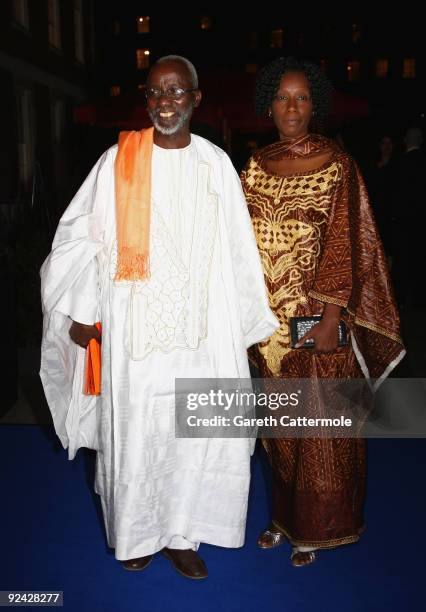 Souleymane Cisse and guest arrive for the Times BFI 53rd London Film Festival Awards Ceremony at Inner Temple on October 28, 2009 in London, England.