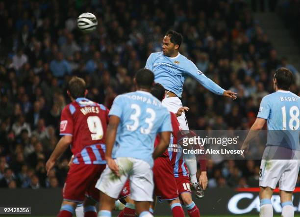 Joleon Lescott of Manchester City scores his goal during the Carling Cup 4th Round match between Manchester City and Scunthorpe United at the City of...