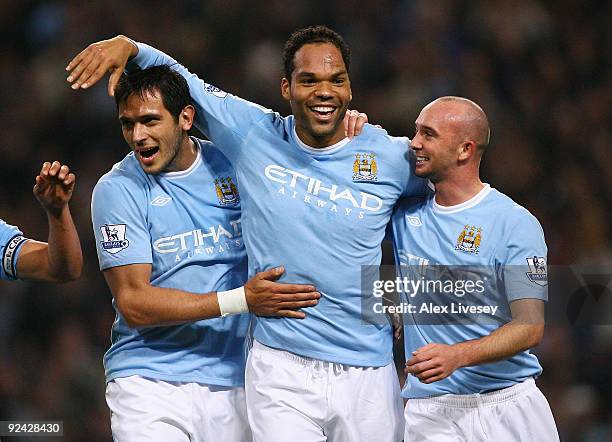 Joleon Lescott of Manchester City celebrates with Roque Santa Cruz and Stephen Ireland after scoring his goal during the Carling Cup 4th Round match...