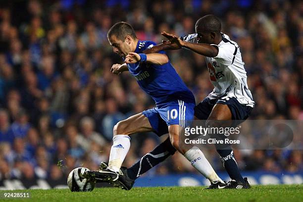 Joe Cole of Chelsea battles for the ball with Fabrice Muamba of Bolton Wanderersduring the Carling Cup 4th Round match between Chelsea and Bolton...