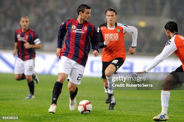 Pablo Daniel Osvaldo of Bologna FC competes with Albin Ekdal of AC Siena during the match of Serie A between Bologna FC and AC Siena at Stadio Renato...